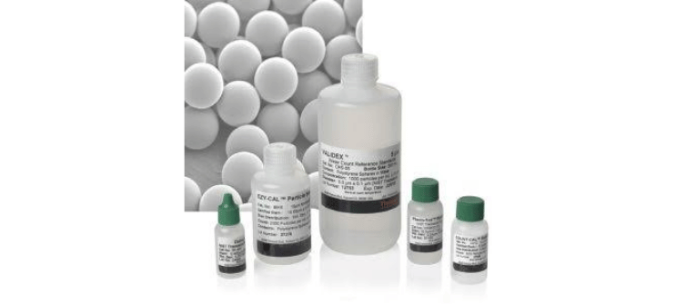 Silica laboratory bottles and vials displayed against a background of white silica particles
