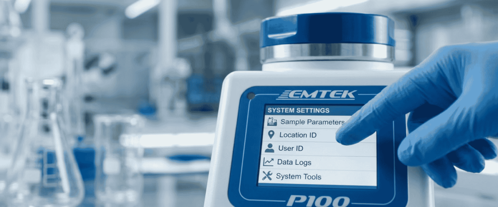 EU GMP Annex Gloved technician operates a Piqo laboratory device displaying system settings in a pharmaceutical lab