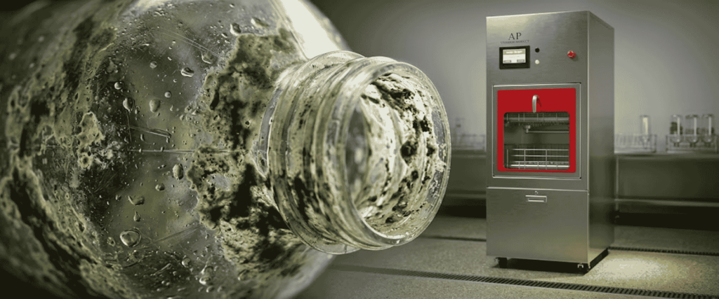 Vivarium a moldy glass bottle beside an automated drinking bottle machine in a dim industrial setting
