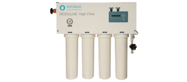 Water Purity ModulaB High Flow filtration system with four white filter housings and digital control panel