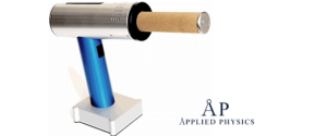 Portable fogger with metallic body and blue handle standing on white base, cylindrical brown filter at nozzle. 