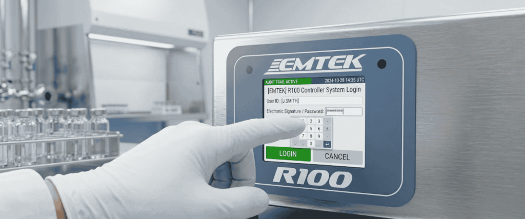 R100 Controllers gloved hand presses login on EMTEK R100 controller panel in a sterile lab with stainless equipment